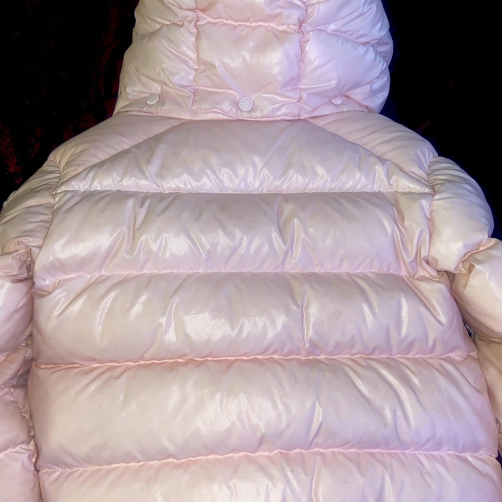 Authenticated Moncler Coat.
